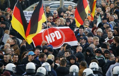 855703-supporters-of-anti-immigration-right-wing-movement-pegida-protest-in-cologne
